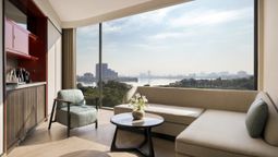 The 207 rooms and suites at Dusit Le Palais Tu Hoa Hanoi feature panoramic views of either West Lake or the city skyline, offering serene and scenic vistas.