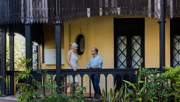 Emilie Roell with Gulam, a team member and one of the first homeowners whose apartment was restored by Doh Eain. Emilie Roell with Gulam, a team member and one of the first homeowners whose apartment was restored by Doh Eain.