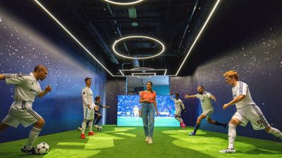 Real Madrid World features roller coasters and interactive exhibits.