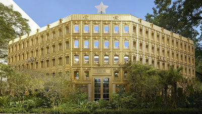 Dior Gold House in Bangkok offers an immersive experience with a golden façade, exclusive collections, Thai art, and Café Dior by Michelin-starred chef Mauro Colagreco.