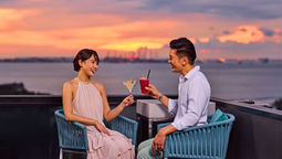 Perched atop The Outpost Hotel, 1-Altitude Coast offers stunning panoramic sea views and vibrant sunsets, perfect for cocktails, relaxation, and unforgettable evenings.