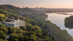 The Silk Lakehouse features 68 rooms and suites, offering views of West Lake or private gardens.