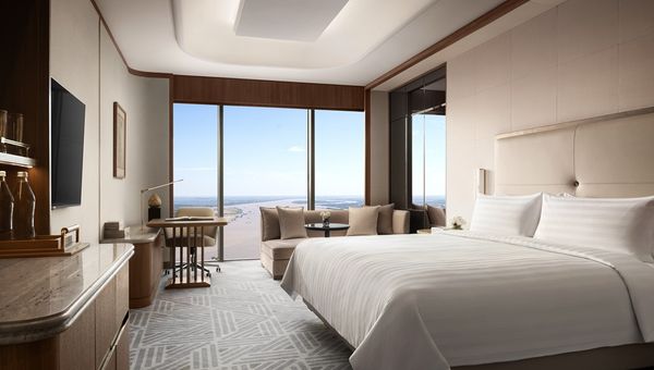 Shangri-La Phnom Penh’s rooms feature panoramic river views, Art Deco, Neo-Classical, and Khmer-inspired designs, with natural wood accents, floor-to-ceiling windows, and serene, light-filled interiors. Shangri-La Phnom Penh’s rooms feature panoramic river views, Art Deco, Neo-Classical, and Khmer-inspired designs, with natural wood accents, floor-to-ceiling windows, and serene, light-filled interiors.