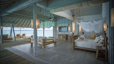 Soneva Secret's 14-villa resort in Maldives offers ultra-bespoke experiences, private butlers, and exclusive culinary journeys amidst scenic surroundings.