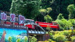 The Alishan Forest Railway is a historic Taiwanese railway, offering scenic journeys through mountainous terrain, famous for its engineering and panoramic views.